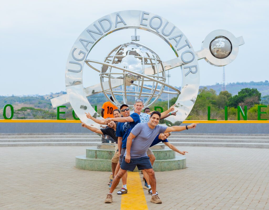 Traveler planting a tree to support conservation in Uganda